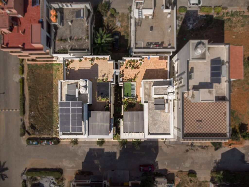 From the aerial view, the vastness of the duplex residence is awe-inspiring, showcasing the unique mirrored layout and the seamless connectivity that binds the two homes in a harmonious relationship.
