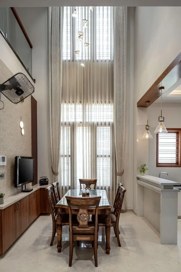 North facing house the rustic browns, dark greys and whites complement each other in the dining-kitchen areas