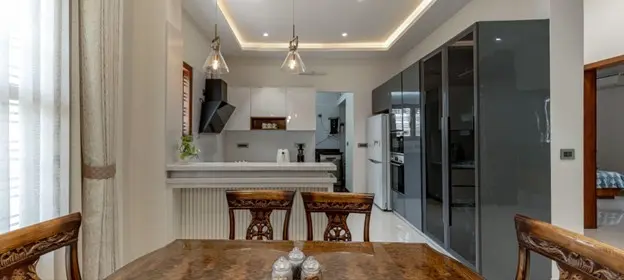 North facing house view of dining-kitchen areas