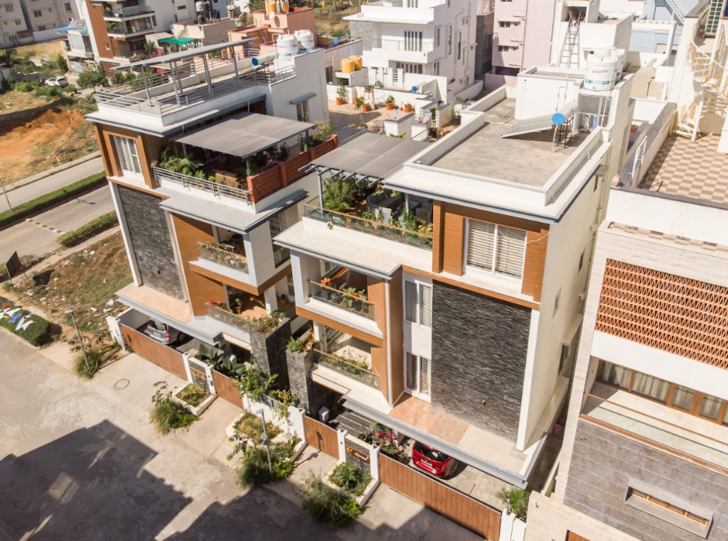 Independent home design showcasing a twin home with built-in services, spacious balconies, and efficient urban planning.