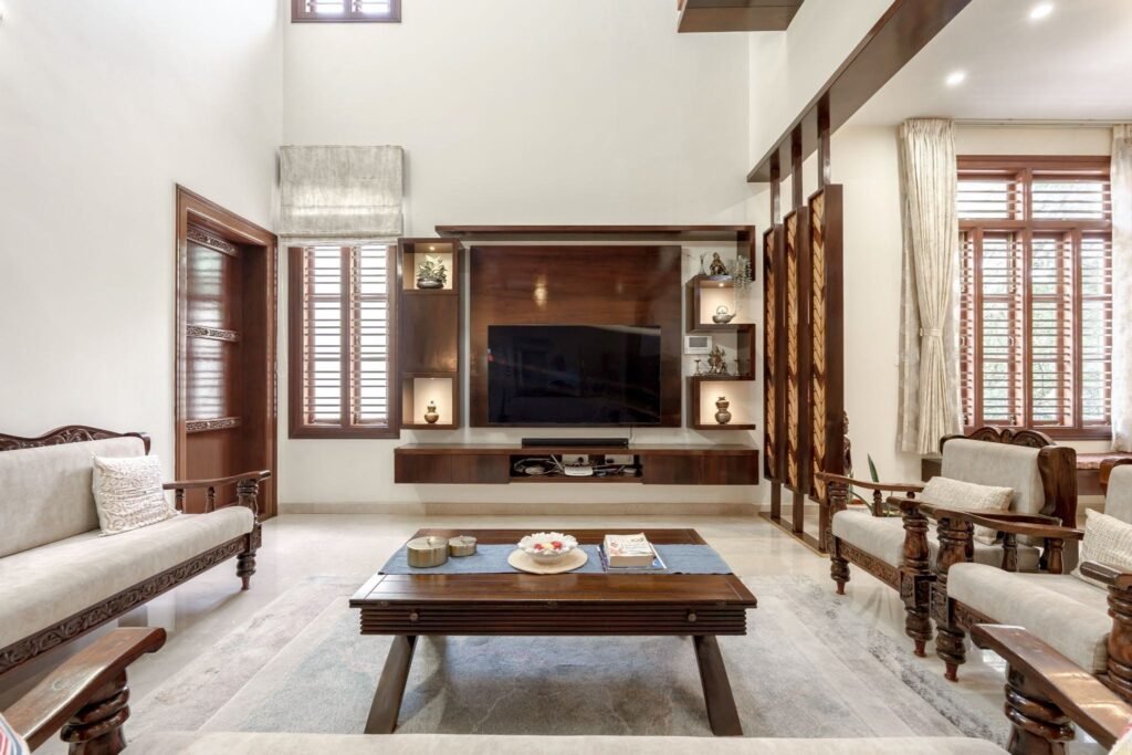 Home planning featuring a spacious double-height living room with luxury interiors, large windows, and abundant natural light.