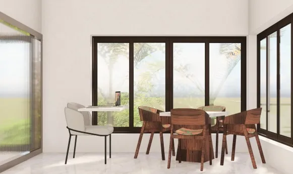 Spanish House Design showing a bright home office interior with large windows, wooden furniture, and natural light