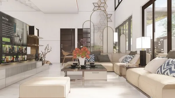 Spanish House Design showing an open living room interior with large windows, neutral seating, and bright natural light